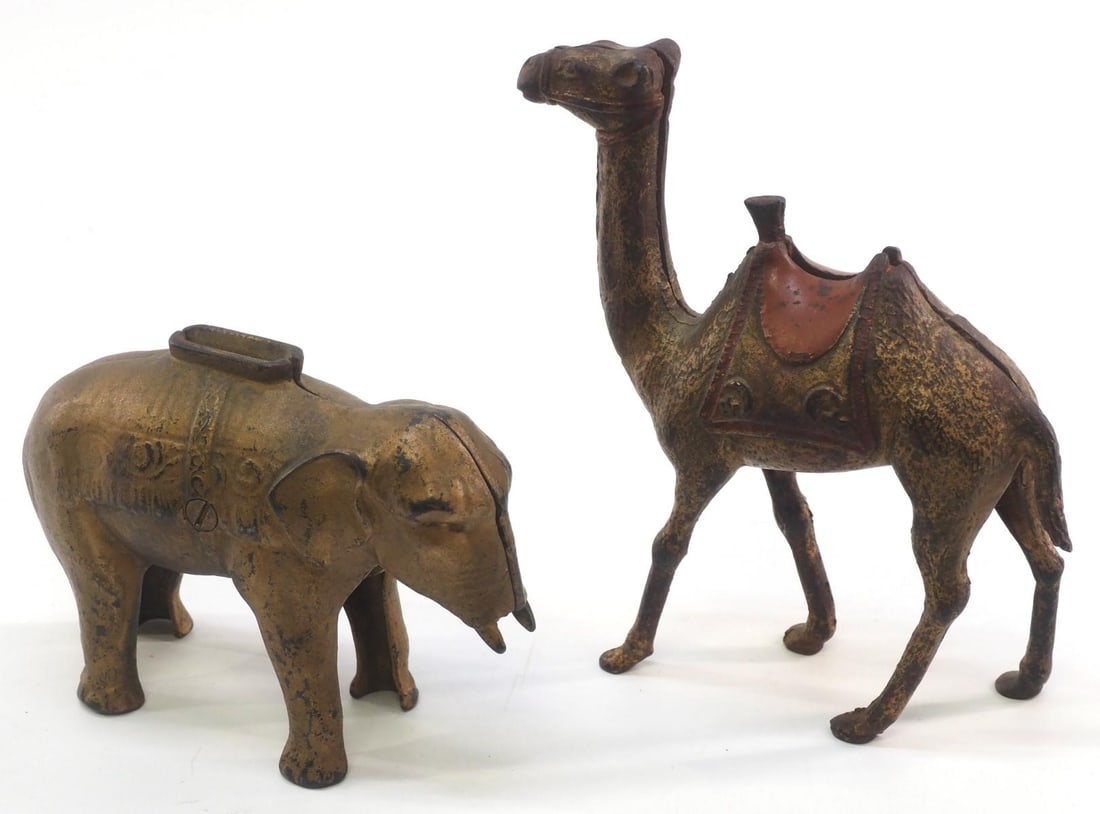 (2) Cast iron animal banks: (2) Cast iron animal banks: camel 7"H / elephant 4.5"H - both Very Good