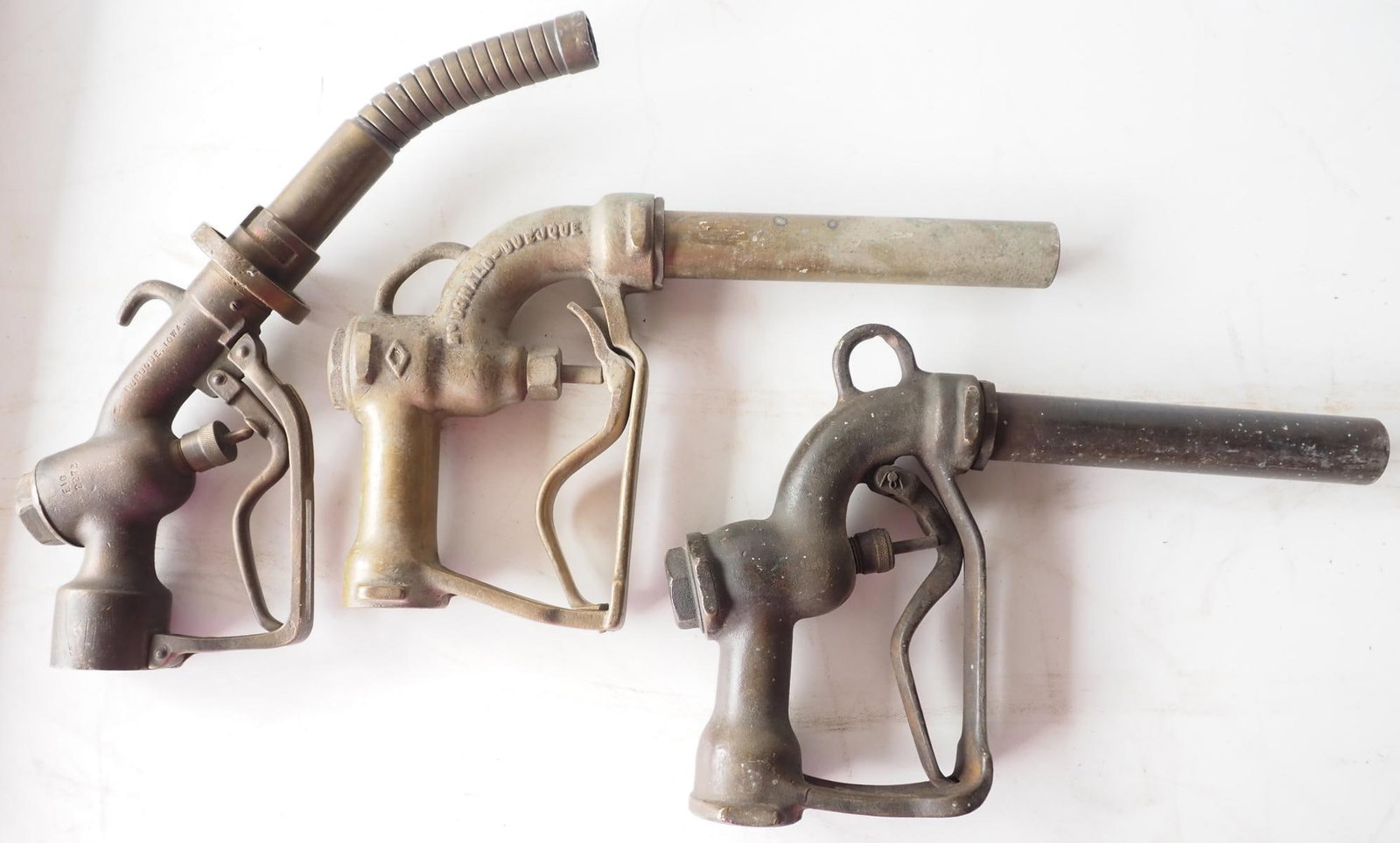 (3) Brass gas pump nozzles: (3) Brass gas pump nozzles