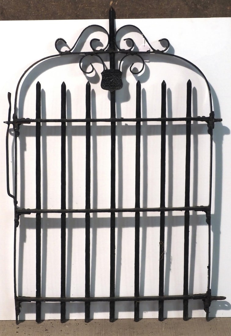Ornate cast iron fence gate: Ornate cast iron fence gate with Stewart Iron Works, Cincinnati, Ohio badge, 35"x51"H * * NOT ELIGIBLE FOR IN-HOUSE SHIPPING. Please contact the auction house for transport options and additional