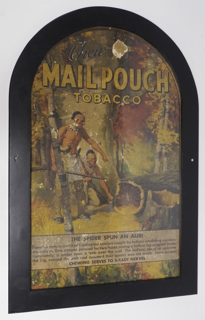 Mail Pouch Tobacco cardboard advertisement: Mail Pouch Tobacco cardboard advertisement "The Spider Spun An Alibi" with Indian graphics, in 24"x37" wood frame