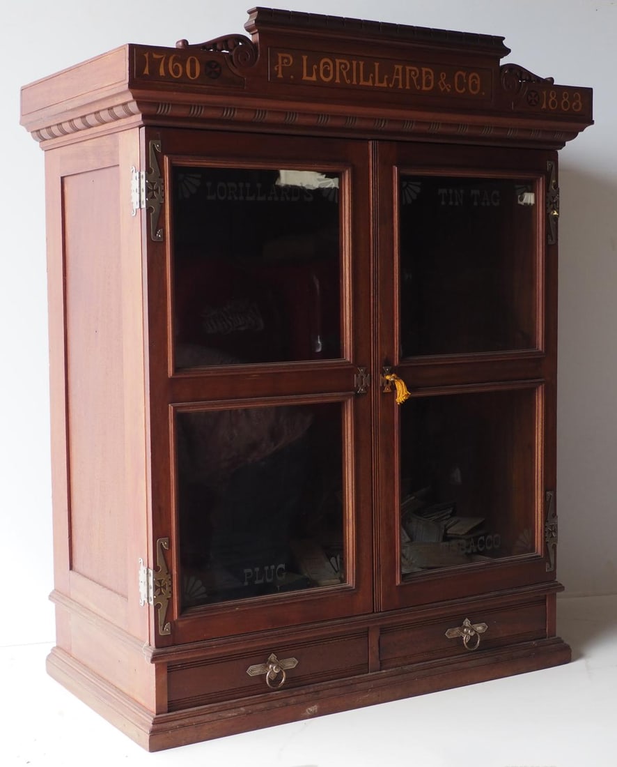 P. Lorillard & Co. country store cabinet: P. Lorillard & Co. 2-door country store product cabinet with etched glass doors - glass is replaced but original glass is in drawer, one piece of trim loose * * NOT ELIGIBLE FOR IN-HOUSE SHIPPING.