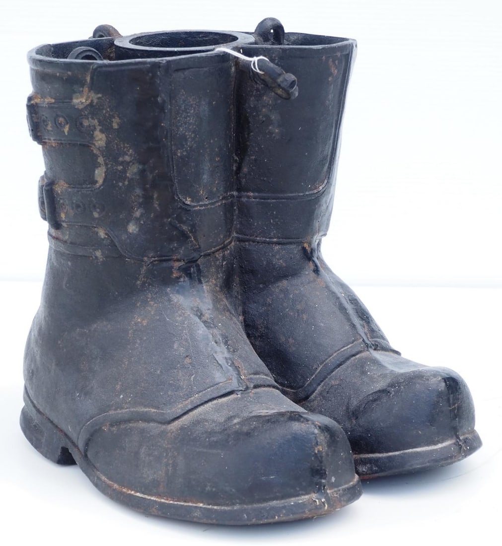 Cast iron boot-shaped Christmas tree stand (1 of 3)