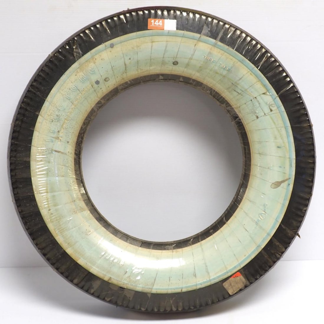NOS Firestone Deluxe Champion white wall tire: NOS Firestone Deluxe Champion white wall tire * * NOT ELIGIBLE FOR IN-HOUSE SHIPPING. Please contact the auction house for transport options and additional details. Items must be picked up within 10