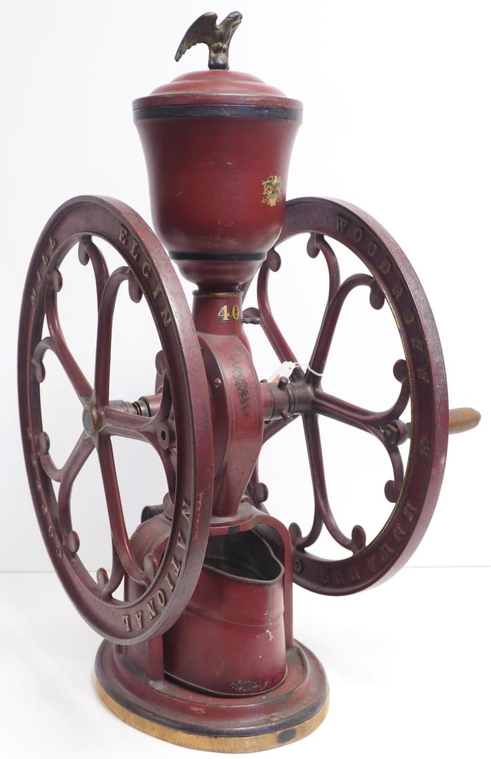 Elgin National No.40 coffee mill: Elgin National No.40 coffee mill with original paint and eagle finial, wheel is 19"dia.