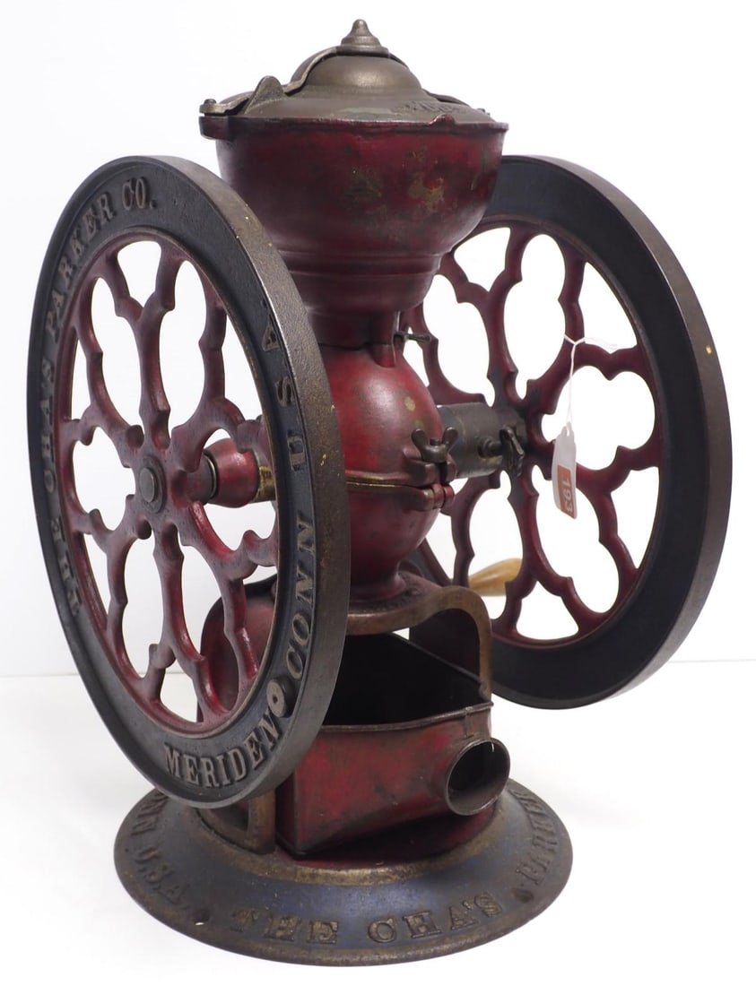 Cha's Parker Co. No.700 coffee grinder: Cha's Parker Co. No.700 coffee grinder with original paint, wheel is 16.5"dia. * * NOT ELIGIBLE FOR IN-HOUSE SHIPPING. Please contact the auction house for transport options and additional details.
