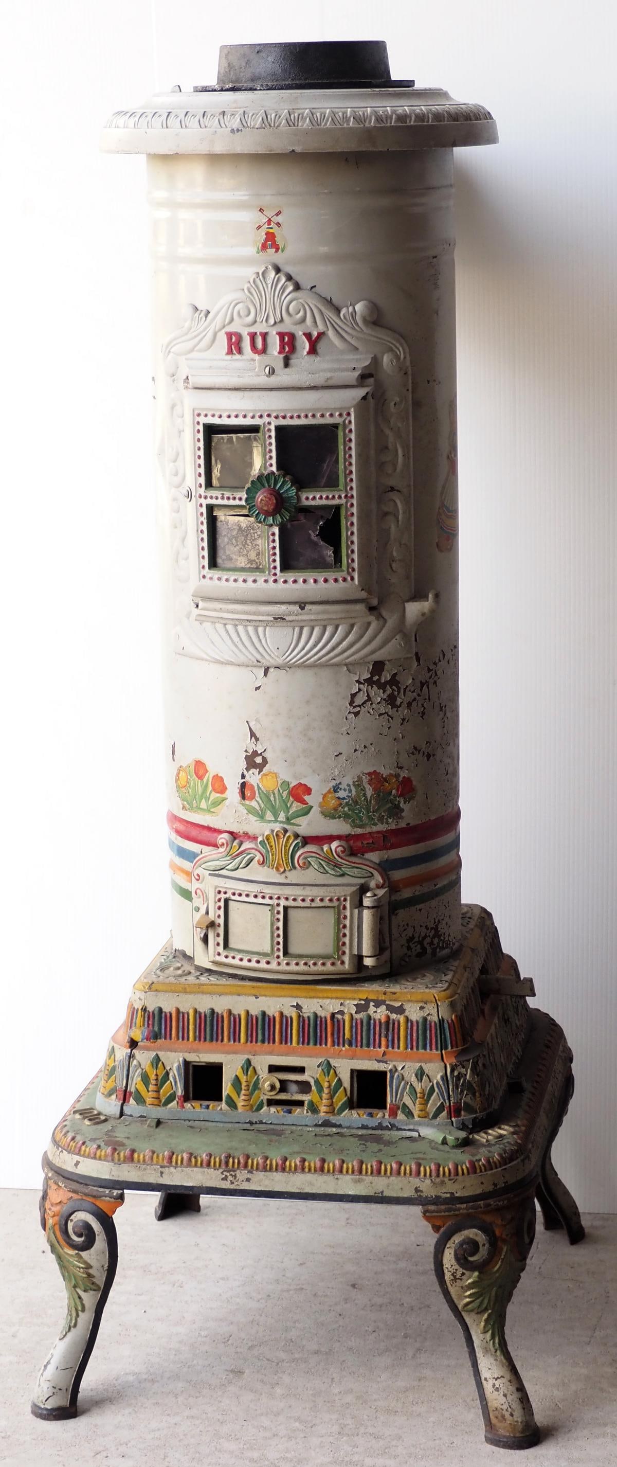 Cribben Sexton & Co. Ruby cast iron stove: Cribben Sexton & Co. Ruby cast iron stove with decorative painting * * NOT ELIGIBLE FOR IN-HOUSE SHIPPING. Please contact the auction house for transport options and additional details. Items