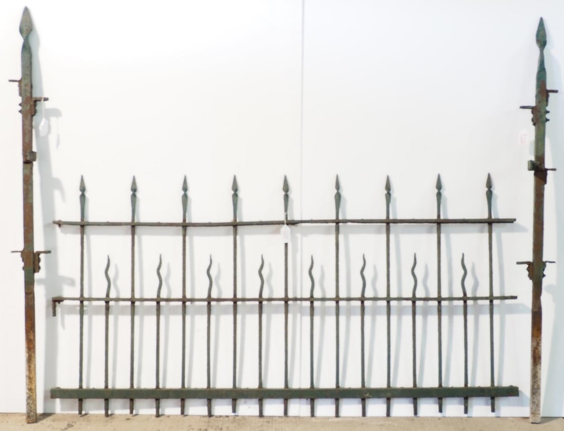 8-pc set of ornate cast iron fence: 8-pc set of ornate cast iron fence, (2) 73"L sections, (1) 81.5" section, (1) 29"L section, (4) 64"H posts * * NOT ELIGIBLE FOR IN-HOUSE SHIPPING. Please contact the auction house for transport