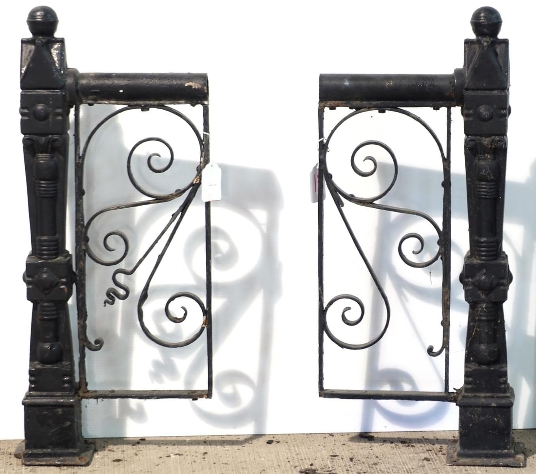 Set of cast iron rail sections with posts: Set of cast iron rail sections with posts, each 32"H x 13"W * * NOT ELIGIBLE FOR IN-HOUSE SHIPPING. Please contact the auction house for transport options and additional details. Items must be picked
