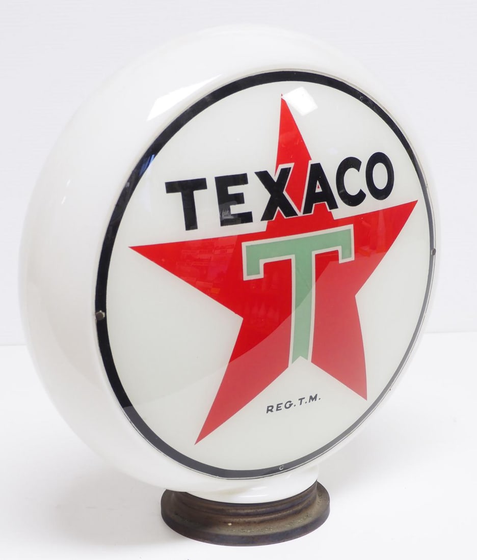 (2) Texaco glass gas pump globe lenses: (2) Texaco glass gas pump globe lenses in glass body * * NOT ELIGIBLE FOR IN-HOUSE SHIPPING. Please contact the auction house for transport options and additional details. Items must be picked up