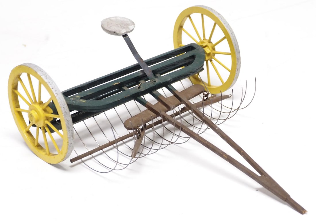 Wooden horse-drawn dump rake with box (1 of 5)