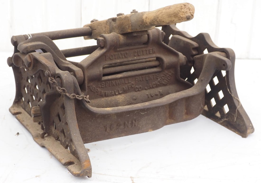 Aspinwall Mfg. hand-operated potato cutter: Aspinwall Mfg. hand-operated potato cutter * * NOT ELIGIBLE FOR IN-HOUSE SHIPPING. Please contact the auction house for transport options and additional details. Items must be picked up within 10