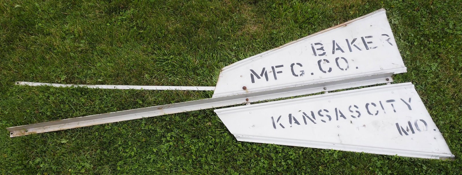 Windmill fan tail marked Monitor: Windmill fan tail marked Monitor, Evansville, Wis. and Baker Mfg., Kansas City, MO, 94"L * * NOT ELIGIBLE FOR IN-HOUSE SHIPPING. Please contact the auction house for transport options and additional