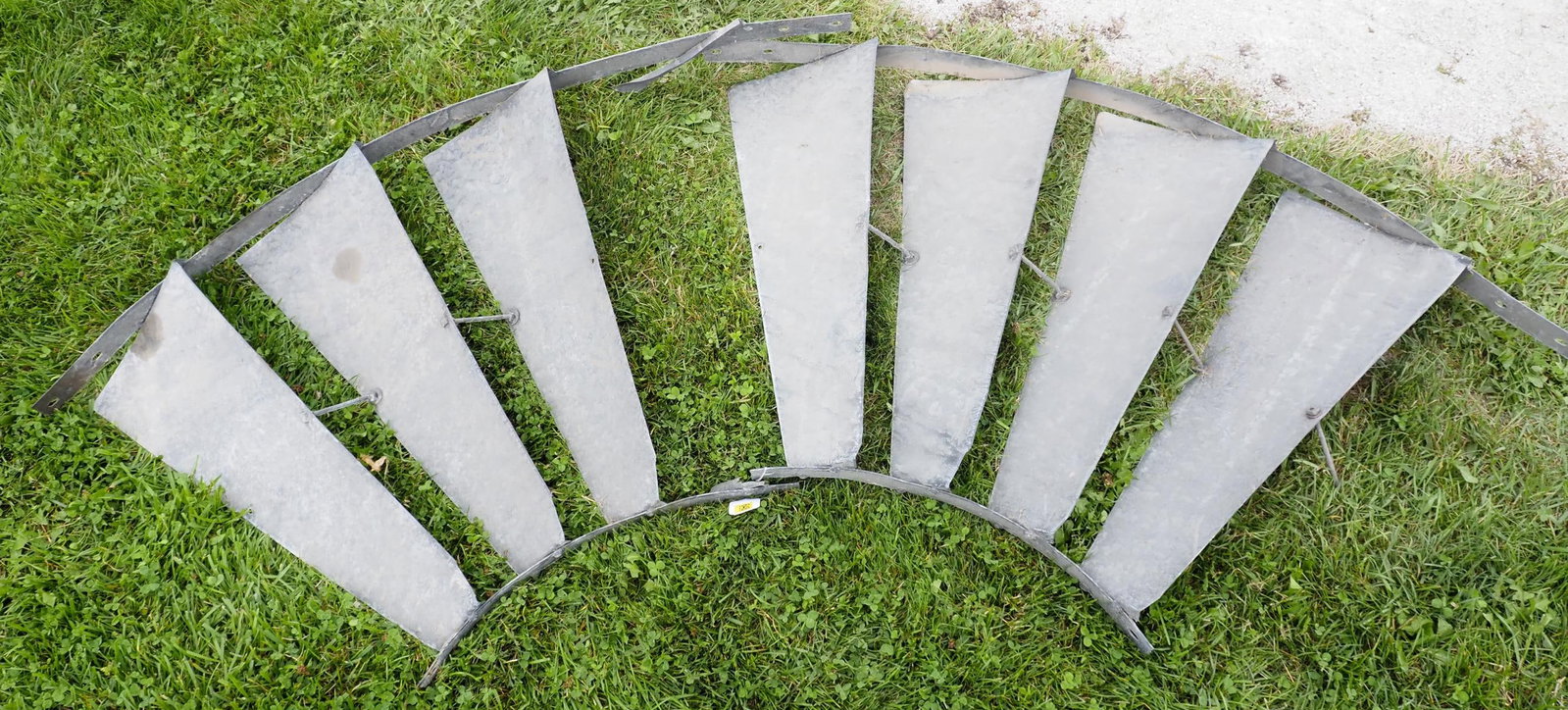 (2) Sections of galvanized windmill fan: (2) Sections of galvanized windmill fan, blades 29"H - one section missing a blade Condition one section missing a blade