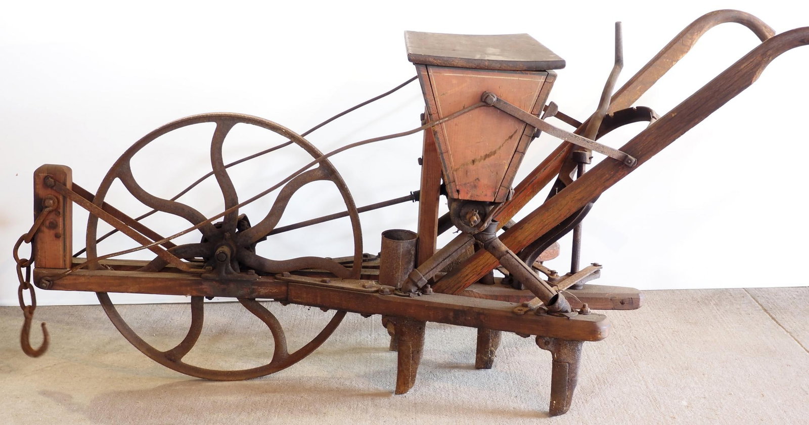 Buckeye No.22 1-horse walk-behind drill: Buckeye No.22 1-horse walk-behind drill with June 19, 1866 patent, excellent inside label and very good original paint * * NOT ELIGIBLE FOR IN-HOUSE SHIPPING. Please contact the auction house for