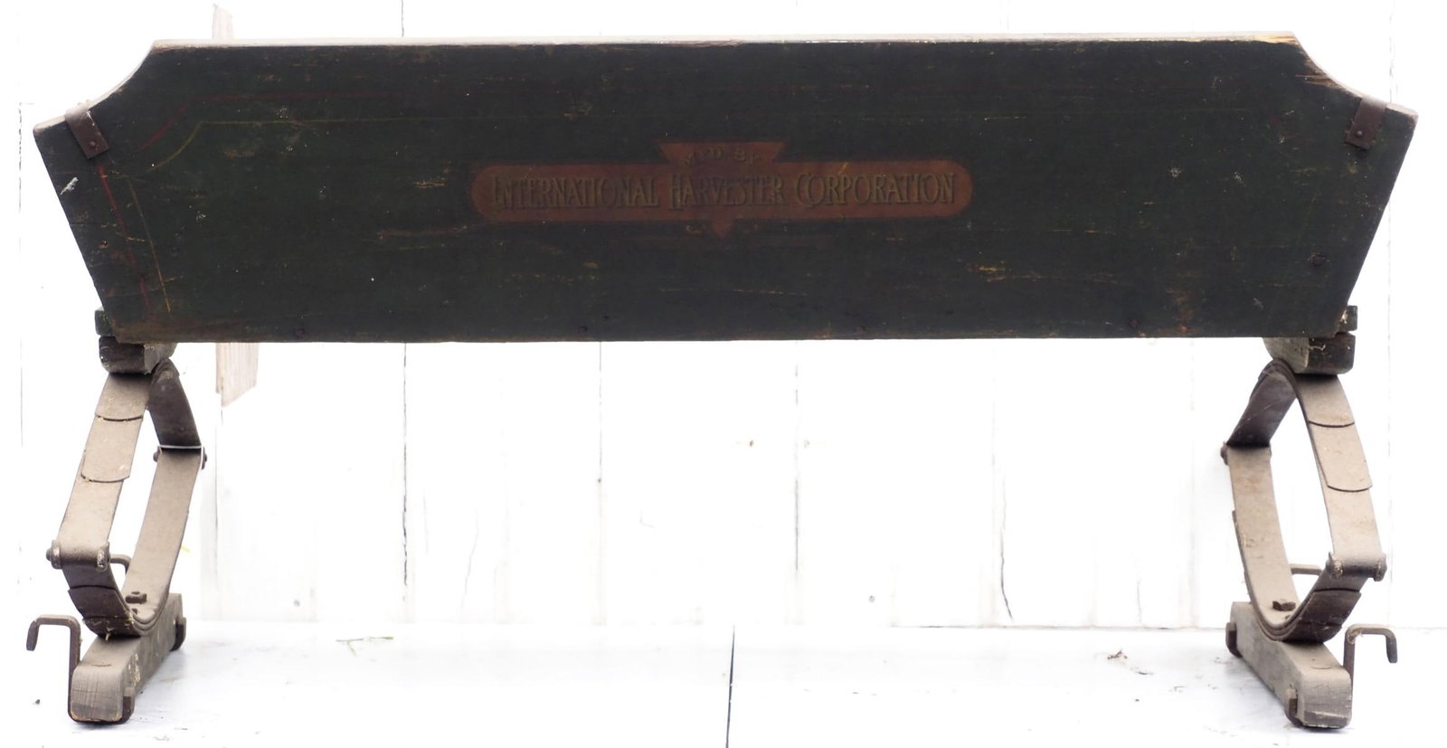 International Harvester Corp. box wagon seat: International Harvester Corporation box wagon seat with good paint and stenciling * * NOT ELIGIBLE FOR IN-HOUSE SHIPPING. Please contact the auction house for transport options and additional