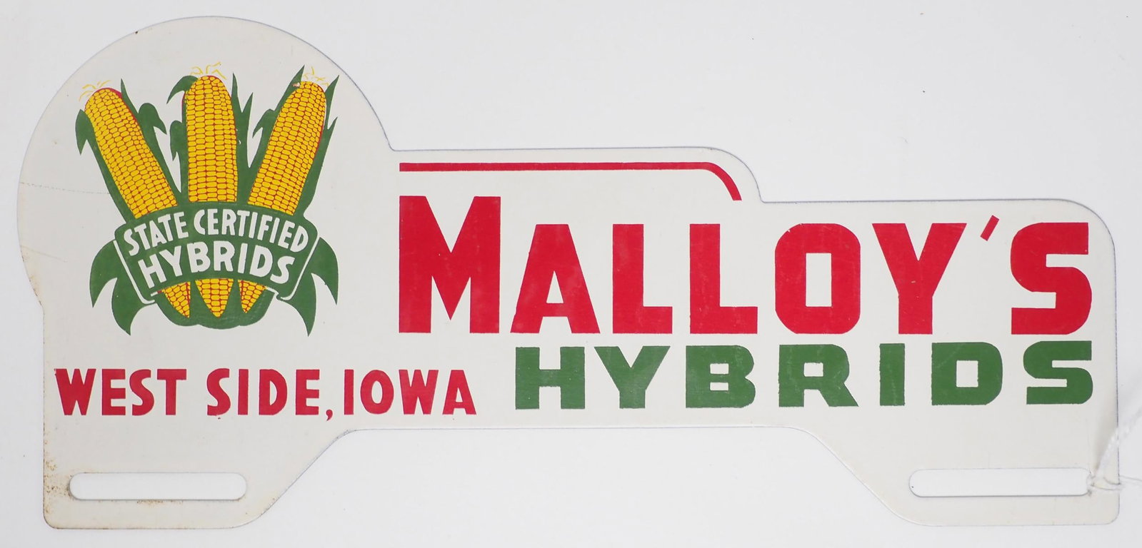 Malloy's Hybrids, West Side tin license plate topper: Malloy's Hybrids, West Side, Iowa tin license plate topper - Very Good Condition Very Good