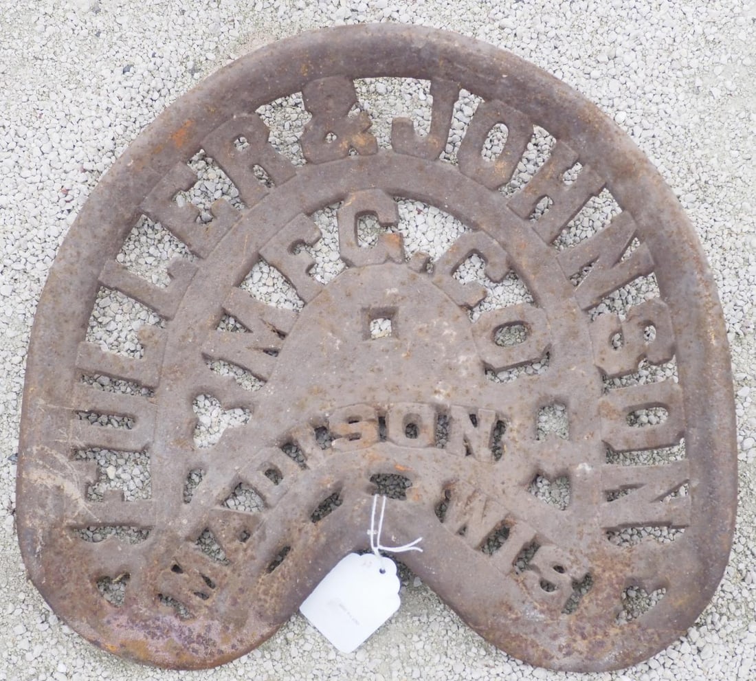 Fuller & Johnson Mfg. Co. Cast iron seat (1 of 1)