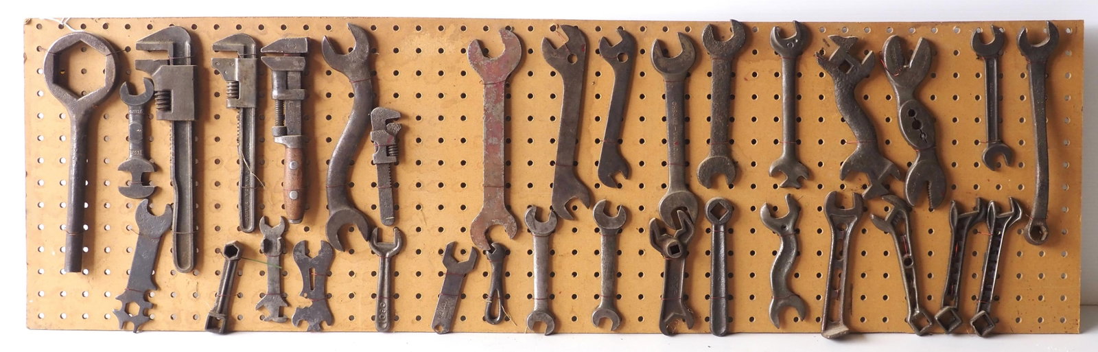 Board of cast iron wrenches (1 of 3)