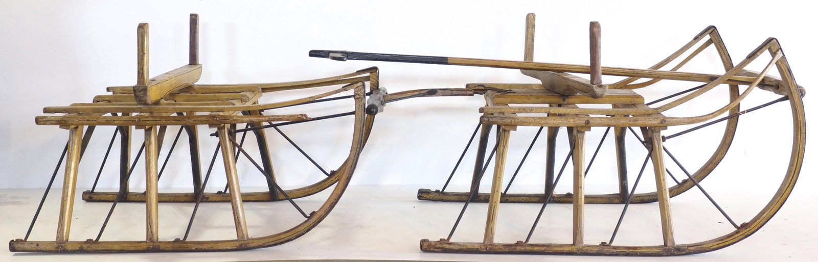 Child size pull-type sled runners: Child size pull-type sled runners made by A. Martin with excellent original paint and stenciling, 66"L - one side rail broken * * NOT ELIGIBLE FOR IN-HOUSE SHIPPING. Please contact the auction house