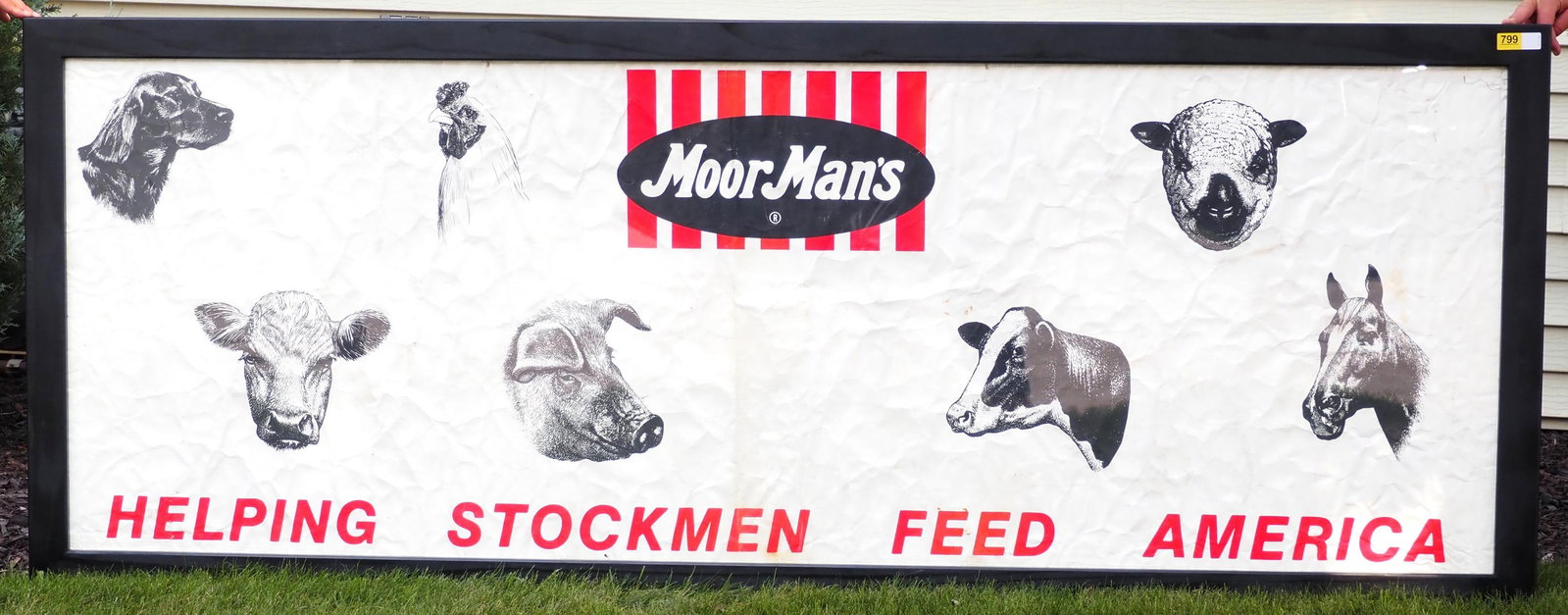 MoorMan's advertisement: 96"x37" paper MoorMan's Helping Stockmen Feed America advertisement with graphics of animals, in added frame - Good with creasing throughout and a few minor tears * * NOT ELIGIBLE FOR IN-HOUSE