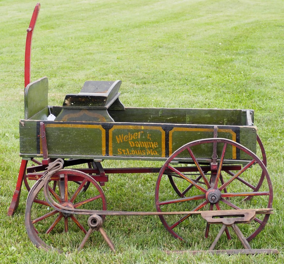 Weber & Damme, St Louis MO goat wagon: Weber & Damme, St Louis MO goat wagon with runners, pull handle and seat, EXCELLENT original paint and stenciling! * * NOT ELIGIBLE FOR IN-HOUSE SHIPPING. Please contact the auction house for