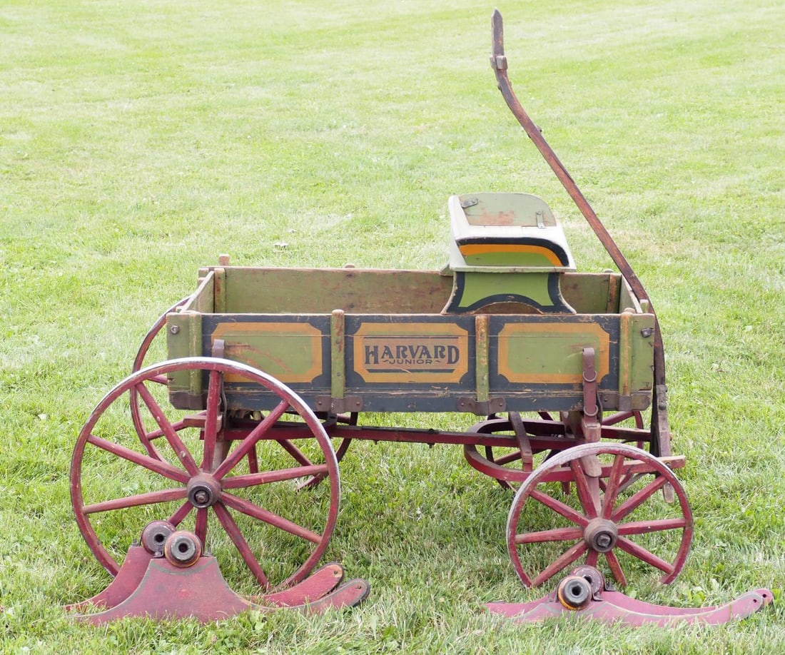 Harvard Jr goat wagon: Harvard Jr goat wagon with seat, runners and pull handle, EXCELLENT original paint and stenciling * * NOT ELIGIBLE FOR IN-HOUSE SHIPPING. Please contact the auction house for transport options and