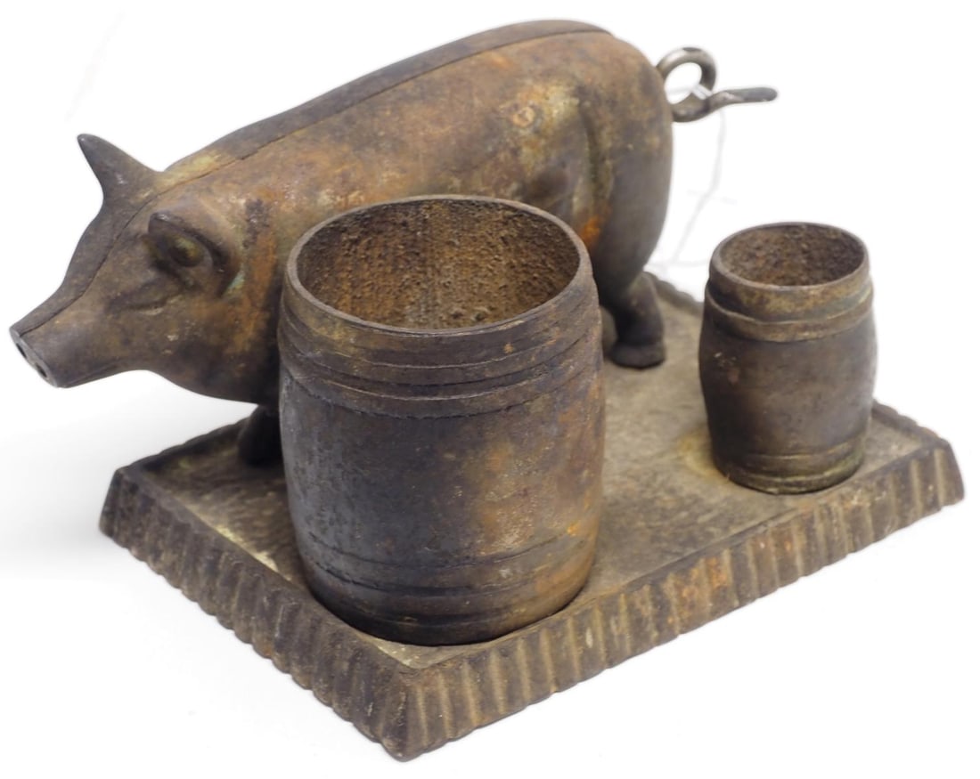Cast iron pig-shaped cigar cutter and match holder (1 of 3)