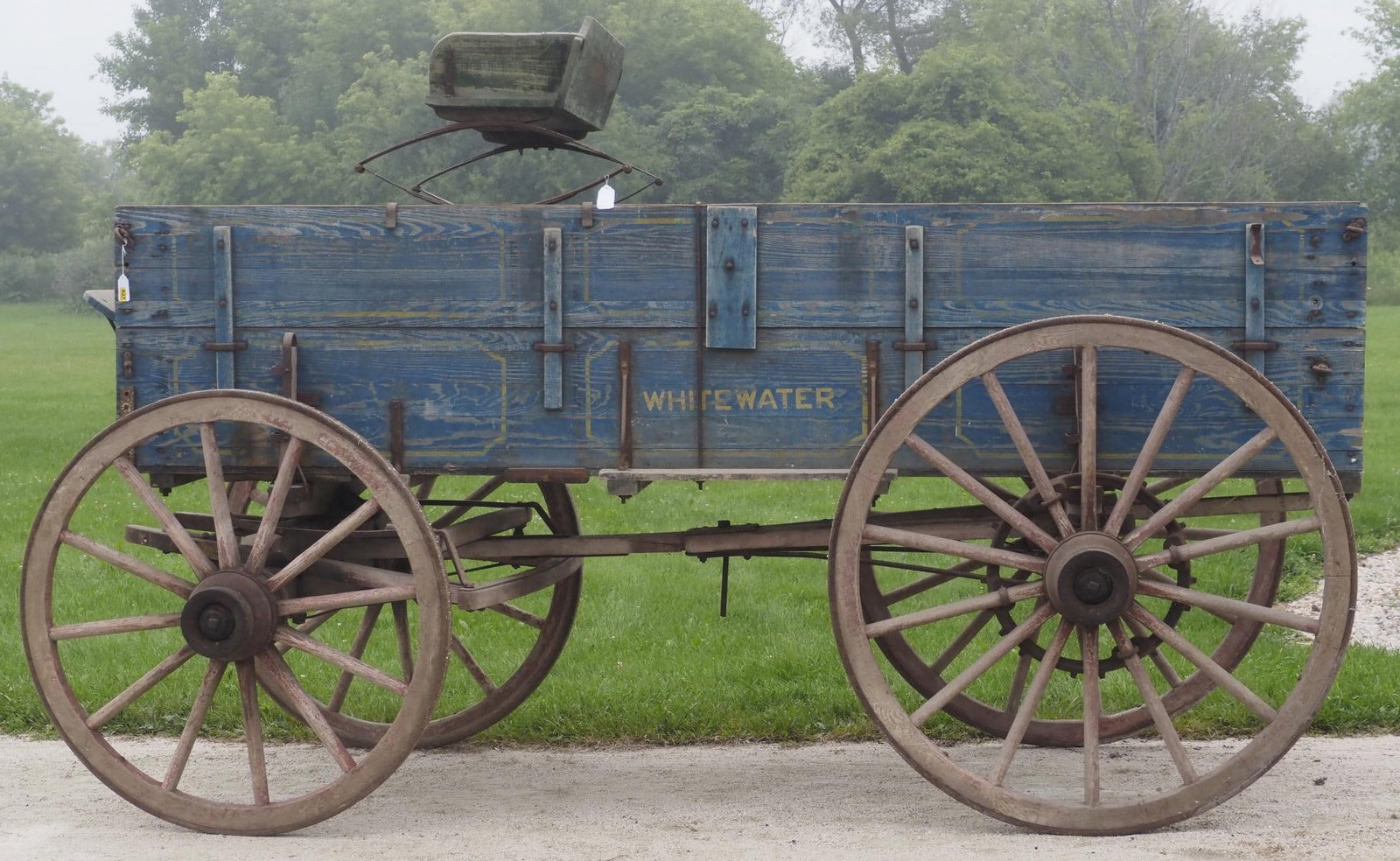 Whitewater double board box wagon: Whitewater double board box wagon with short tongue and good original paint, on Weber gear, rear wheels 51"dia., front wheels 45"dia., 134"L overall (seat sells separate) - Good * * NOT ELIGIBLE FOR