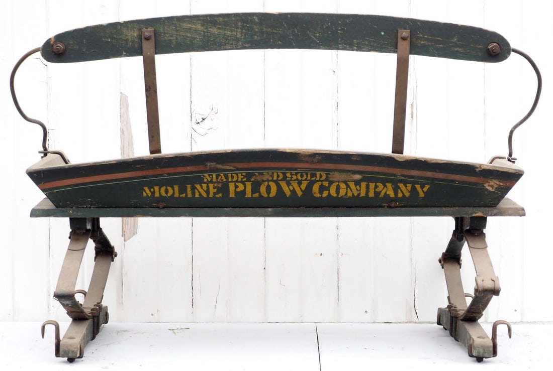 Box wagon seat: Box wagon seat with stenciling "Made and Sold by Moline Plow Company" * * NOT ELIGIBLE FOR IN-HOUSE SHIPPING. Please contact the auction house for transport options and additional details. Items must 