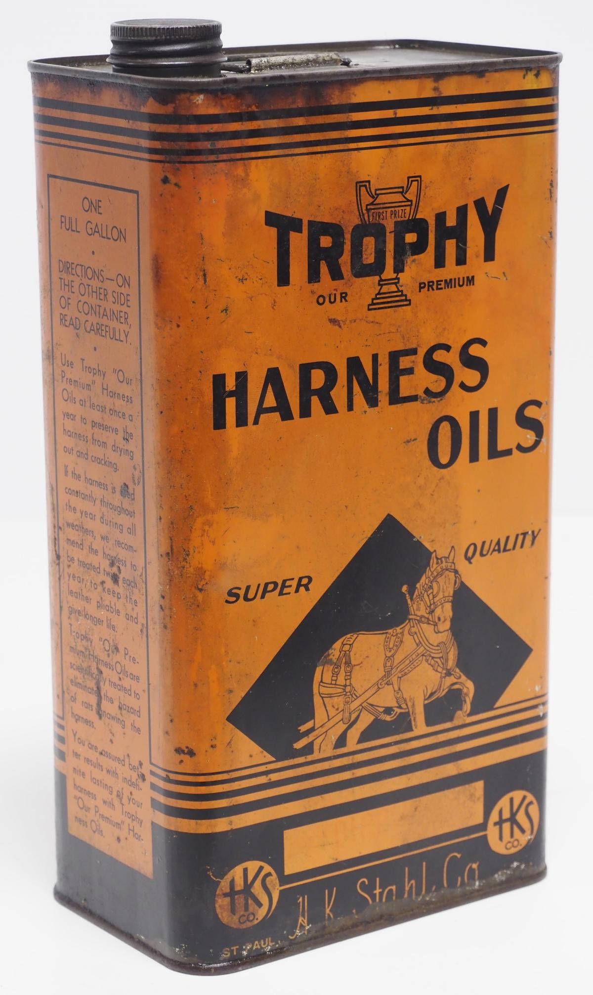 1-gallon Trophy Harness Oils tin: 1-gallon Trophy Harness Oils tin with great graphics of horse with harness, empty - Good, 2 holes near top Condition Good, 2 holes near top