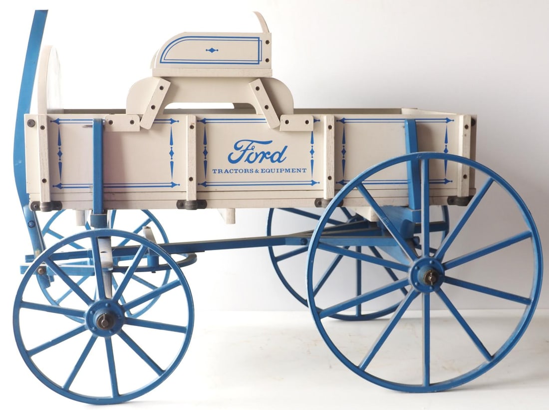 Ford wooden pull-type goat wagon: Ford wooden pull-type goat wagon with metal wheels * * NOT ELIGIBLE FOR IN-HOUSE SHIPPING. Please contact the auction house for transport options and additional details. Items must be picked up