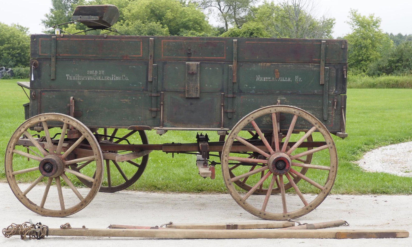 Weber triple board box wagon on Weber gear: Weber triple board box wagon on Weber gear with tongue and eveners, stenciling "Sold By The Hunter Collins Hdw.Co., Nicholasville, KY", rear wheels 44"dia., front wheels 40"dia., 139"L overall * * NOT