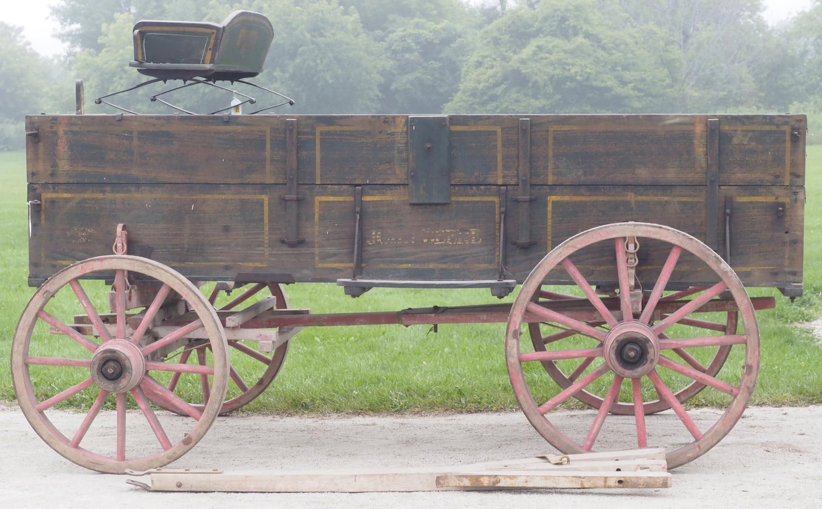 John Deere double board box wagon: John Deere double board box wagon with matching John Deere gear and short tongue, rear wheels 36"dia., front wheels 35"dia., 128"L overall (seat sells separate) - tongue is broken * * NOT ELIGIBLE