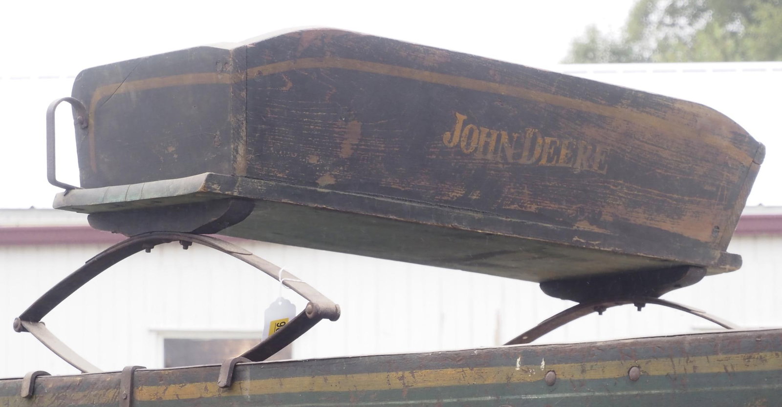John Deere box wagon seat: John Deere box wagon seat with good original paint * * NOT ELIGIBLE FOR IN-HOUSE SHIPPING. Please contact the auction house for transport options and additional details. Items must be picked up