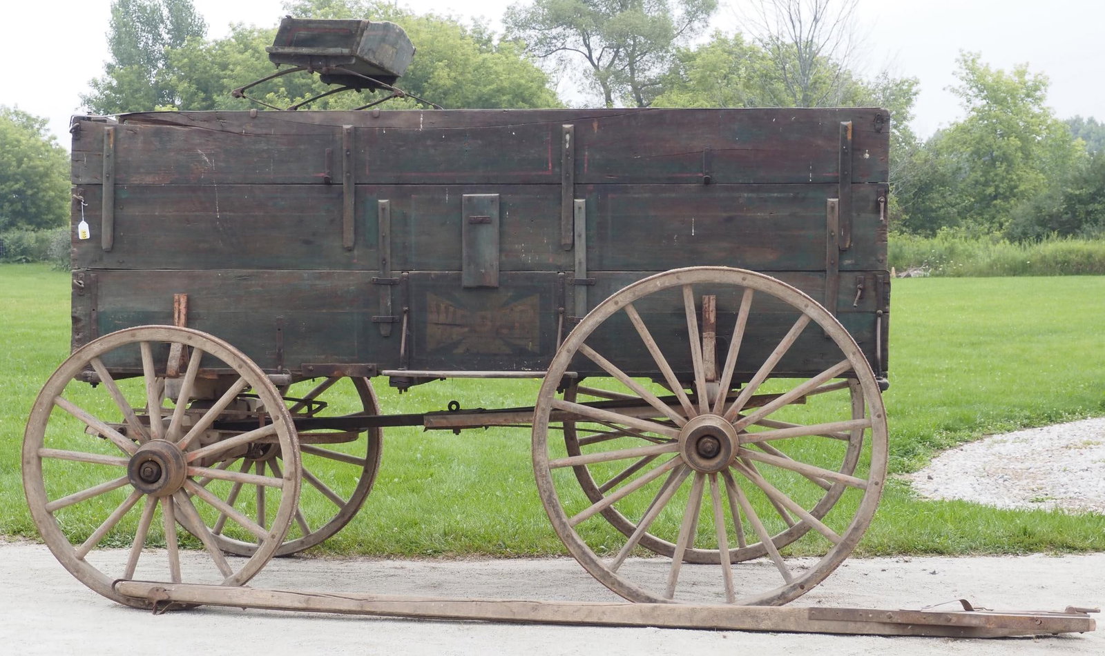 Weber King of All triple board box wagon: Weber King of All triple board box wagon with tongue and Mandt gear, good original paint and stenciling, rear wheels 53"dia., front wheels 43"dia., 132"L overall (seat sells separate) * * NOT