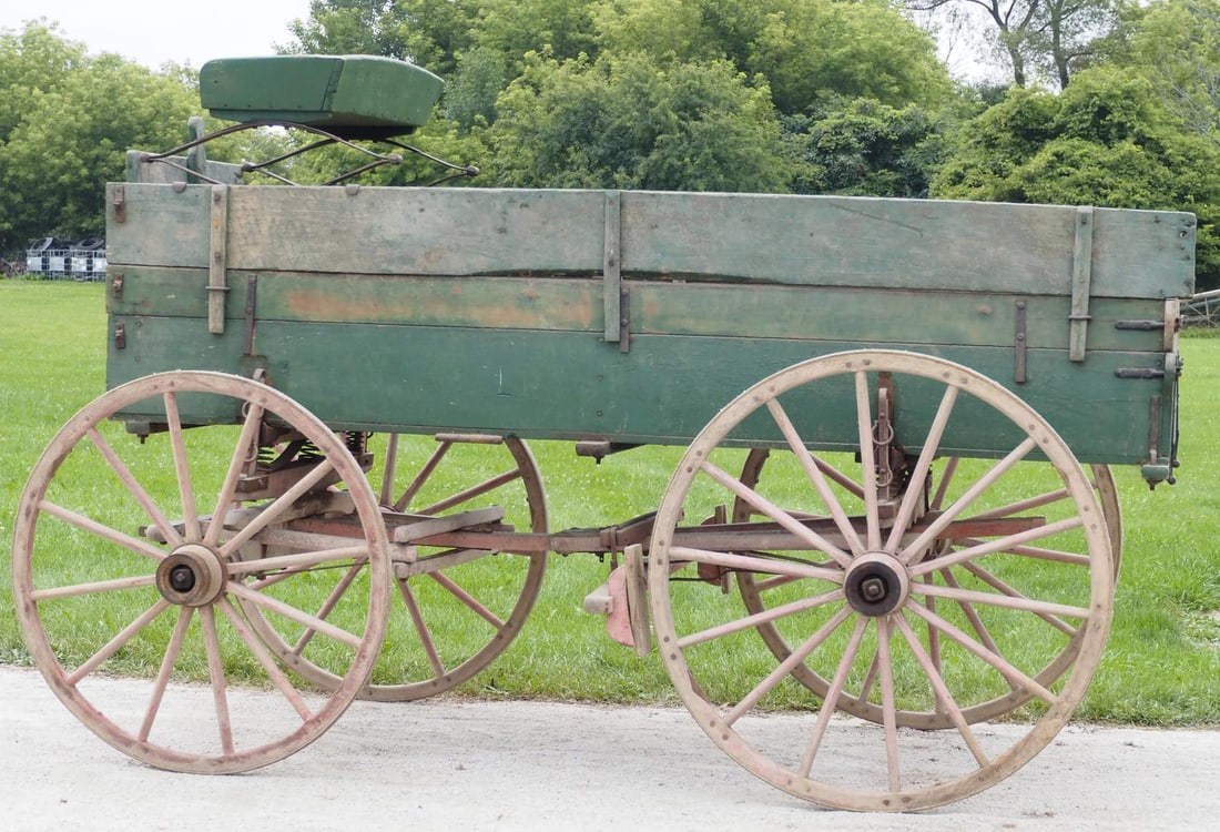Box wagon on Hickman Ebbert Co. gear: Box wagon on Hickman Ebbert Co. Owensboro KY gear, green paint, seat included, rear wheels 44"dia., front wheels 40"dia., 116"L overall * * NOT ELIGIBLE FOR IN-HOUSE SHIPPING. Please contact the