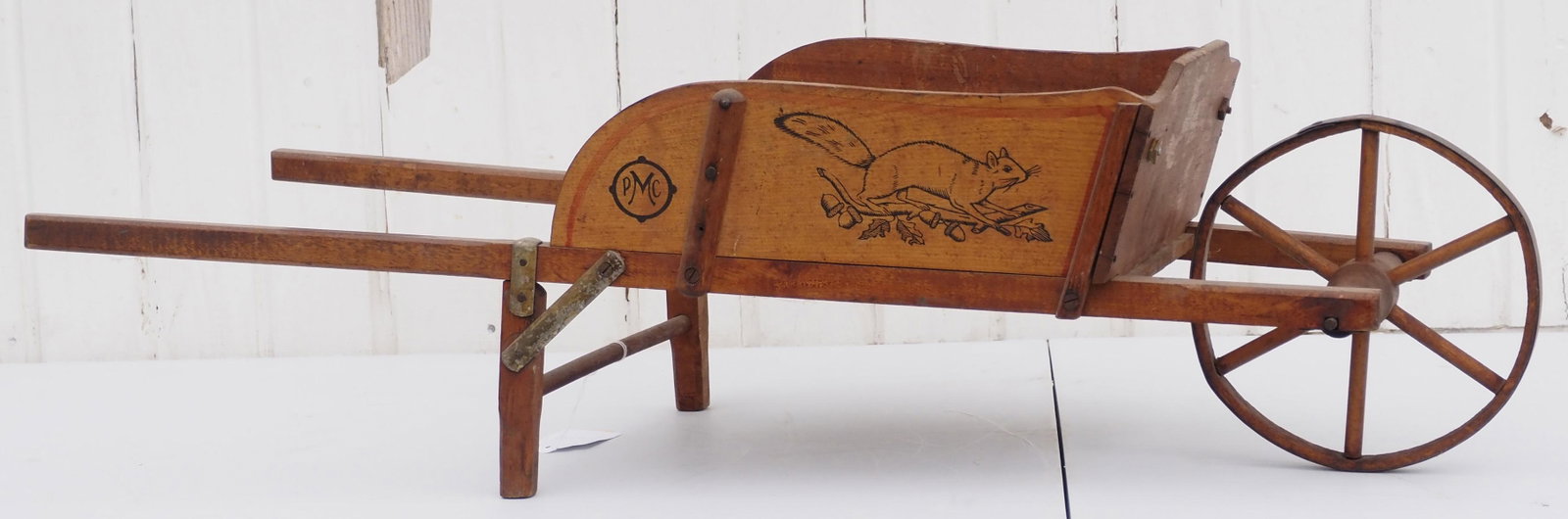 Paris Mfg. Co. No.1 child's wheelbarrow: Paris Mfg. Co. No.1 child's wooden wheel wheelbarrow with squirrel on side, 34"L - Very Good Condition Very Good