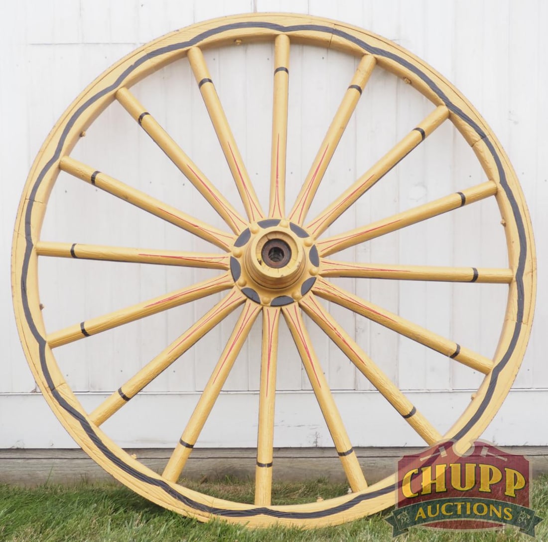 Painted wooden wagon wheel: Painted wooden wagon wheel, 60"dia. * * NOT ELIGIBLE FOR IN-HOUSE SHIPPING. Please contact the auction house for transport options and additional details. Items must be picked up within 10 business da