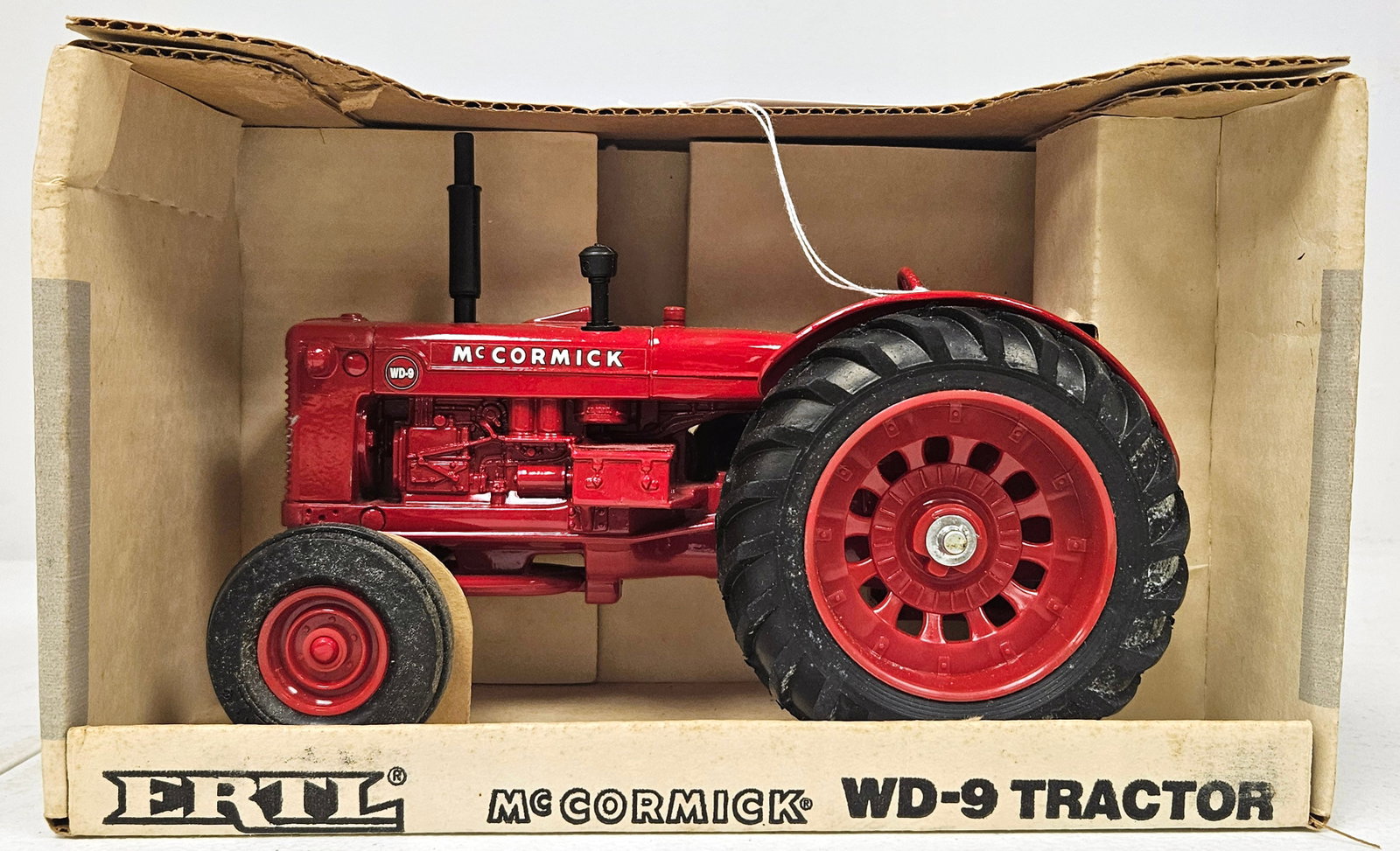 McCormick WD-9 Tractor: Ertl 1/16 Scale McCormick WD-9 Tractor, Stock No. 633 * * Most toy items are eligible for in-house shipping. Oversized items like pedal cars or tractors may require alternate shipping arrangements, wh