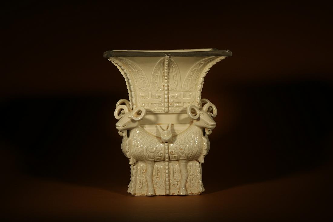 A DING YAO GLAZE PORCELAIN ZUN VASE (1 of 4)