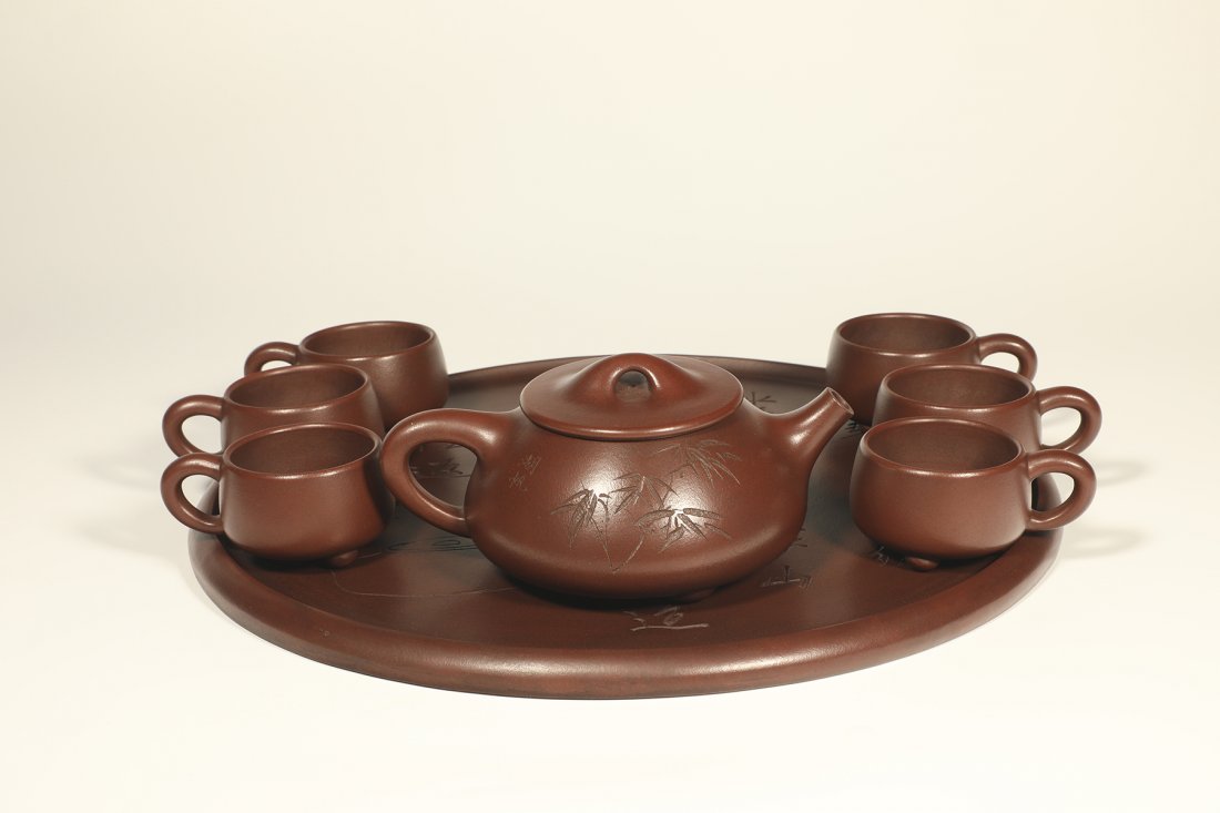 A SET OF EIGHT ZISHA OR PURPLE CLAY TEAPOTS (1 of 3)