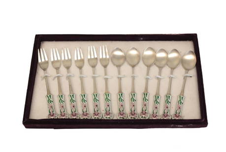 12 Japanese Solid Silver Forks & Spoons, 20th C.: 12 Japanese solid silver forks and spoons, 20th Century. Beautiful enamel florals to the finial. Marked to the verso. Comes with a velvet box. Maker mark "OL" 20th Century Weight: 7.78 ozt Measures: 5