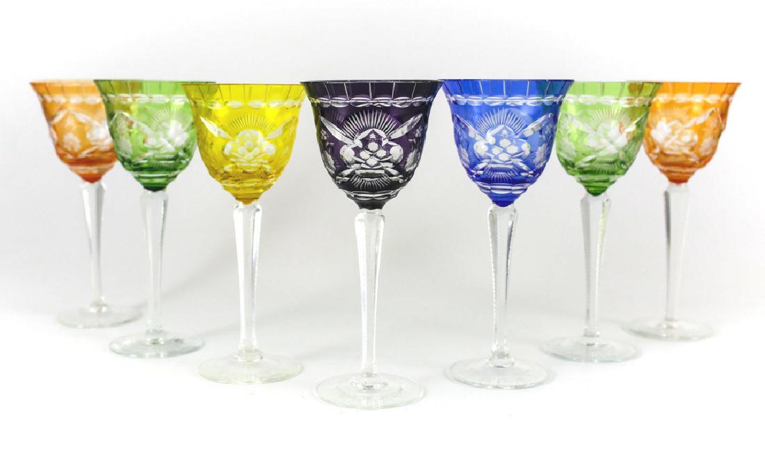 7 Nachtmann Traube Bavaria Art Glass Wine Glasses c1960: 7 Nachtmann Traube Bavaria Art Glass Wine Glasses, c1960 Blue, Green, Orange, Lemon Yellow & Purple on Clear. Beautiful hand cut, polished and chased Foliate & grape design. Unmarked. Weight 3.25 poun
