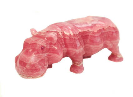 Rhodochrosite Stone & Ruby Hippopotamus Figurine: Rhodochrosite stone & ruby hippopotamus figurine, Retailed by Asprey. The figurine is hand carved to depict a figural hippopotamus with ruby eyes. Comes with the original receipt retailed by Asprey