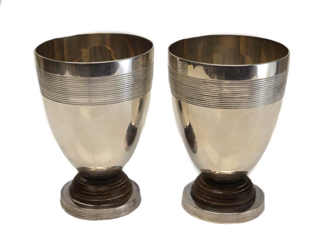 2 Christofle Silverplate Wood Small Footed Beakers: 2 Christofle silverplate and wood small footed beakers, circa 1920. Hand chased circular bands towards the rim and to the base. Wood to the stem. Christofle mark to the underside base. Weight Approx.,