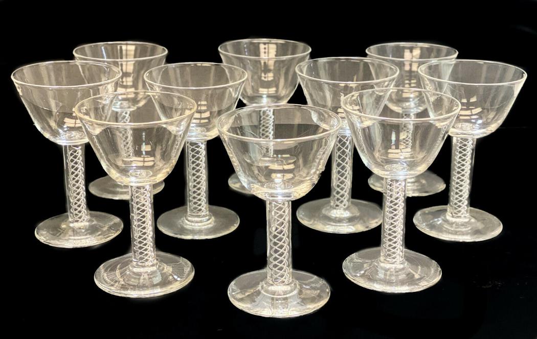 10 Steuben Air Twist Stem Wine Glass Goblets: 10 Steuben wine glass goblets in #7917. Air twists to the stem. Marked "Steuben" to the underside. Weight Approx., 5 lbs Measures Approx., 3.25 inches diameter x 4.825 inches tall