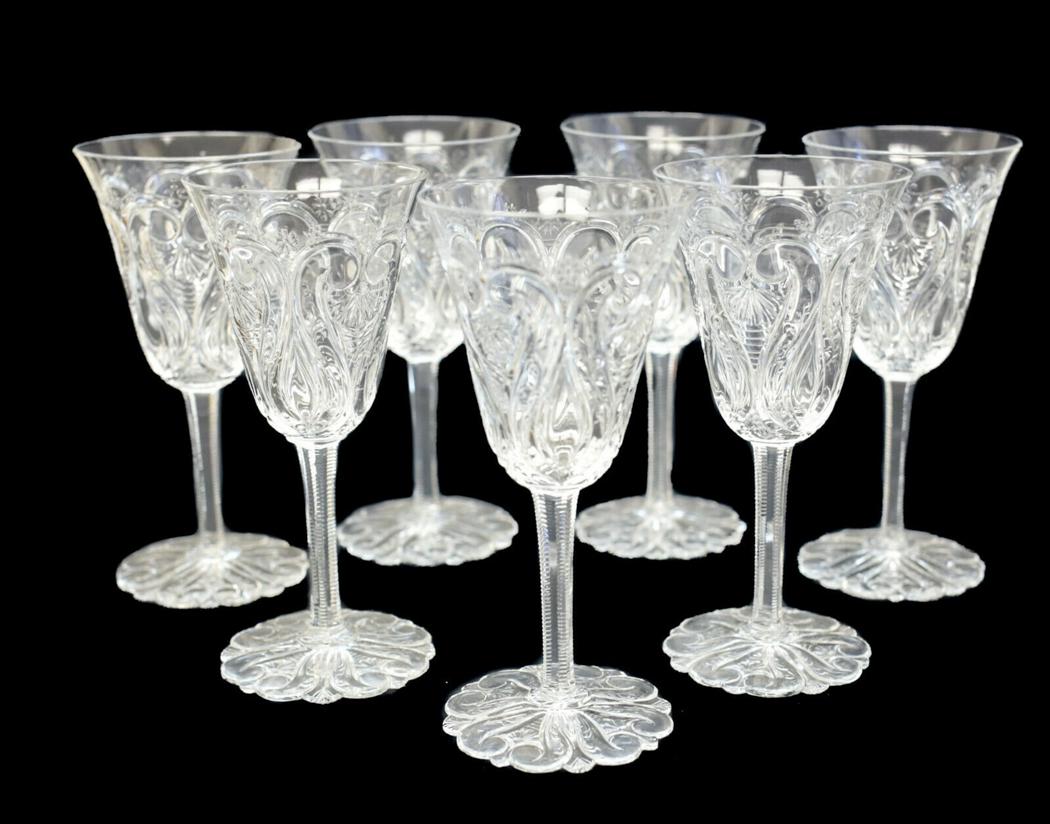 7 Continental Rock Crystal Cut Glass Red Wine Goblets: 7 Continental rock crystal cut glass red wine goblets. Intricate cut swirls throughout. Continental, but likely French. Weight Approx., 4 lbs. Measures Approx., 2.75 inches diameter x 5.75 inches tall