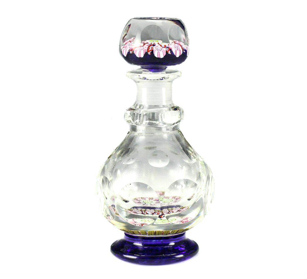 Perthshire Perfume Bottle Millefiori Faceted Glass: Vintage Perthshire Perfume Bottle Flacon with millefiori encased in clear faceted glass. Cobalt blue base. "P" inside bottom of bottle, not visible in photograph. Measures Approx., 6.5 inches height D