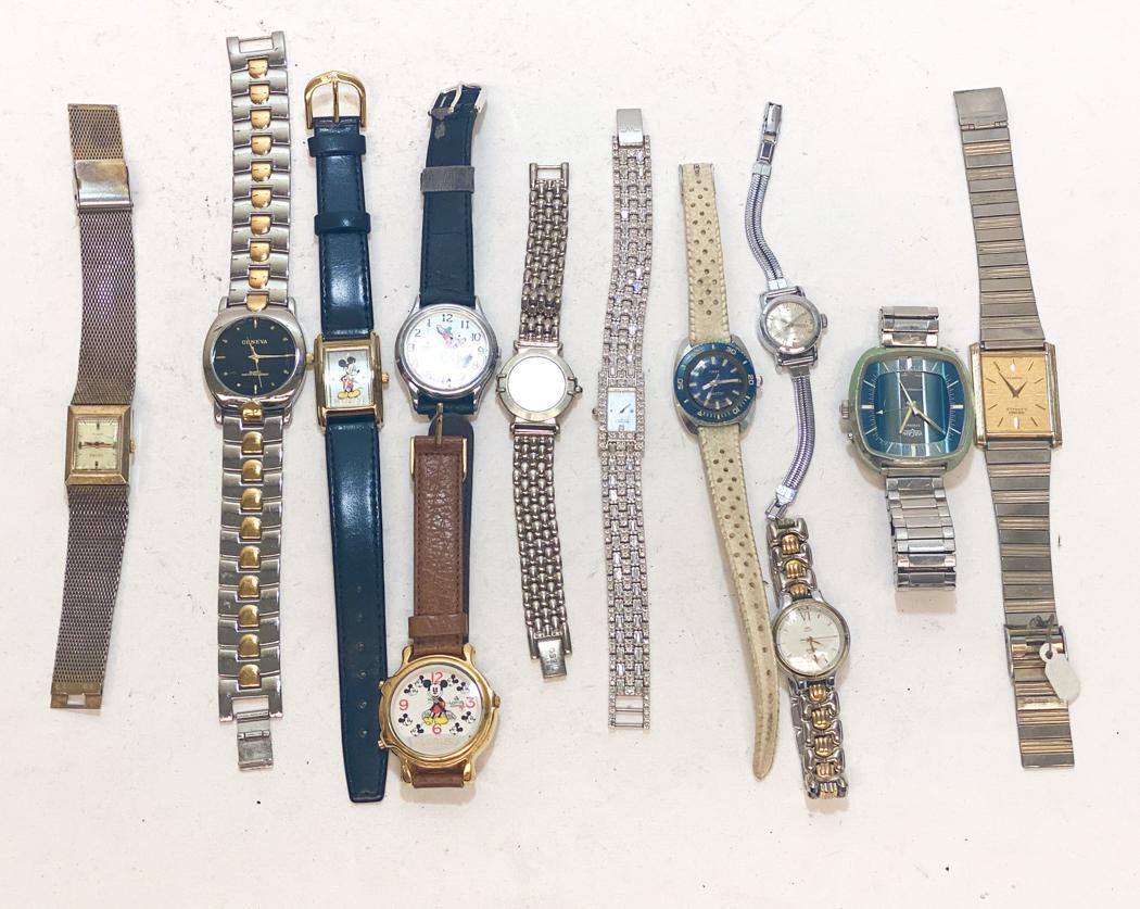 Group of 12 Watches. Geneva, Timex, Disney: Group of 12 wristwatches. Brands include Geneva, Timex, and Disney