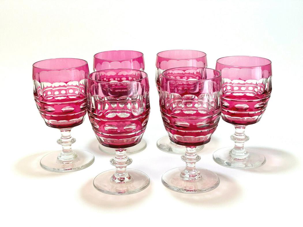 6 Val St Lambert Red Glass Water Goblets in Blarney: 6 Val St (Saint) Lambert ruby red to clear cut glass water goblets in Blarney. Cut glass oval designs throughout. Weight Approx., 3 lbs Measures Approx., 3.25 inches diameter x 6 inches tall Domestic 